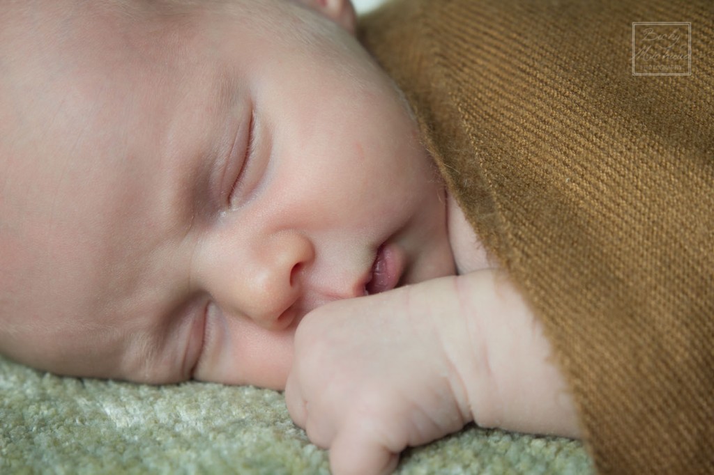 Close up photo of a nine-day-old baby