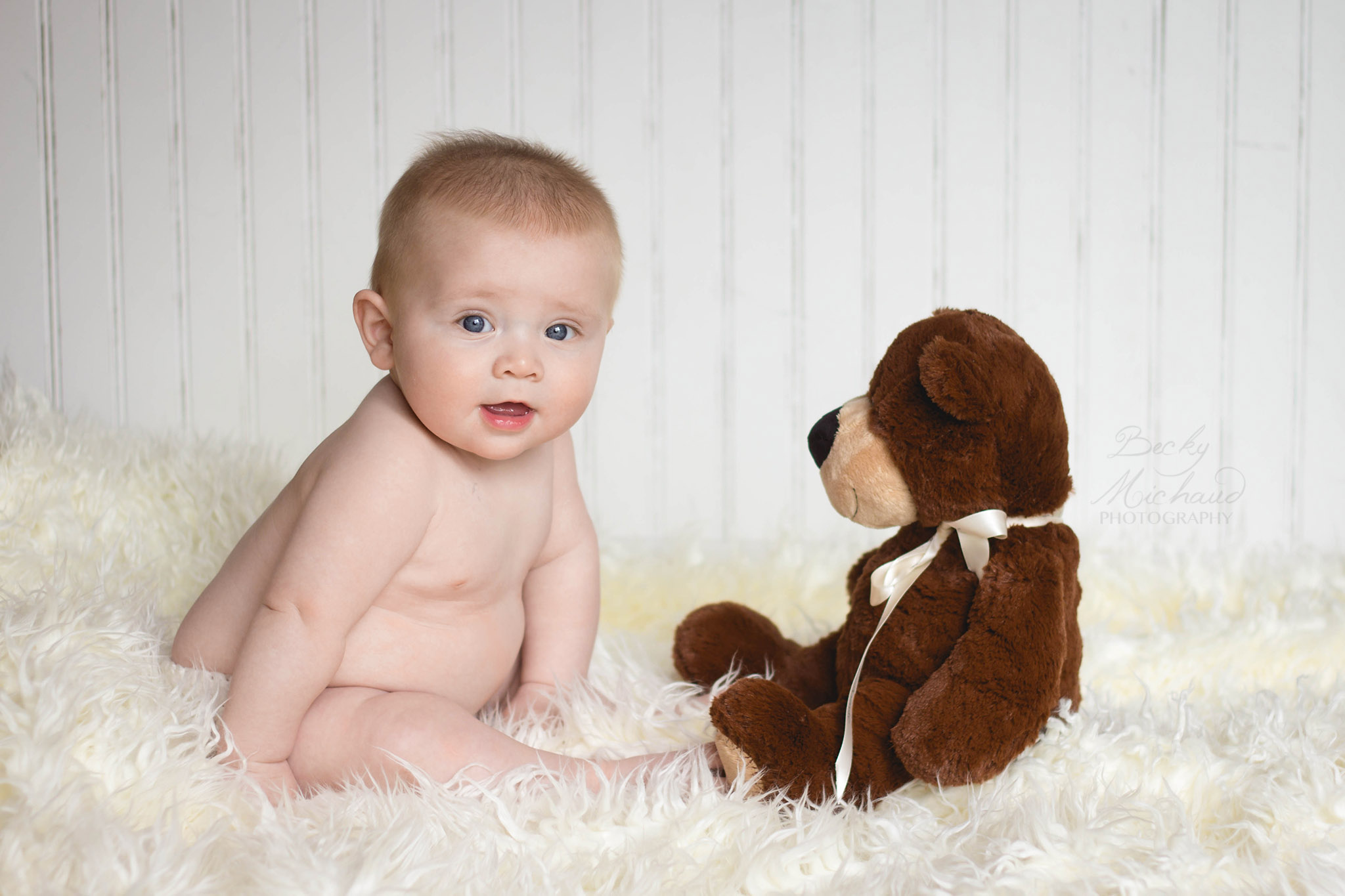 Northern Colorado baby with a stuffed bear