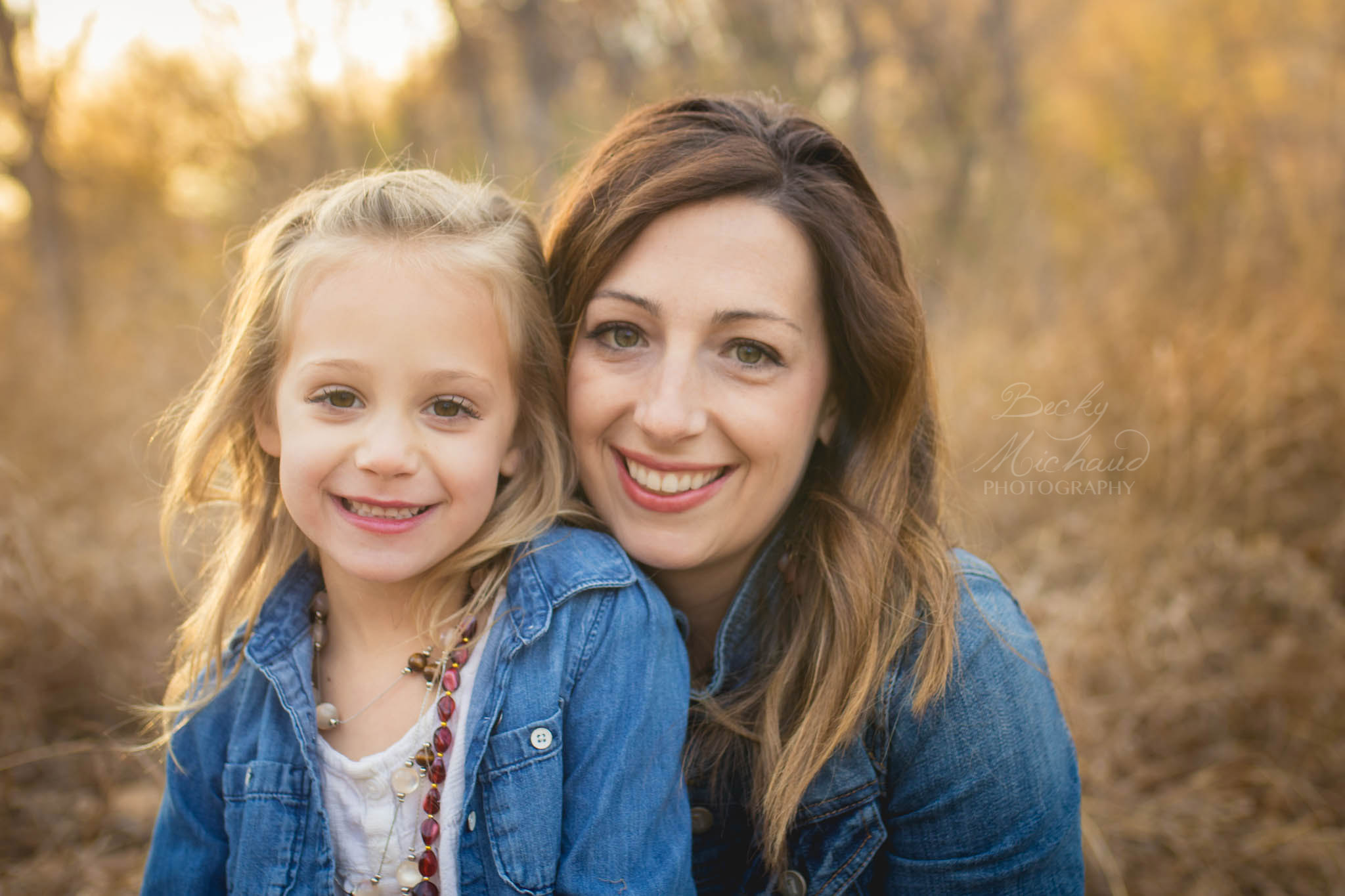 Sunny portrait of a mother and daughter taken by family photographer Becky Michaud