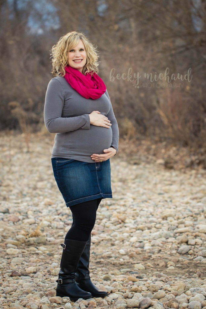 An expectant mother poses for maternity photos by Becky Michaud, Fort Collins photographer