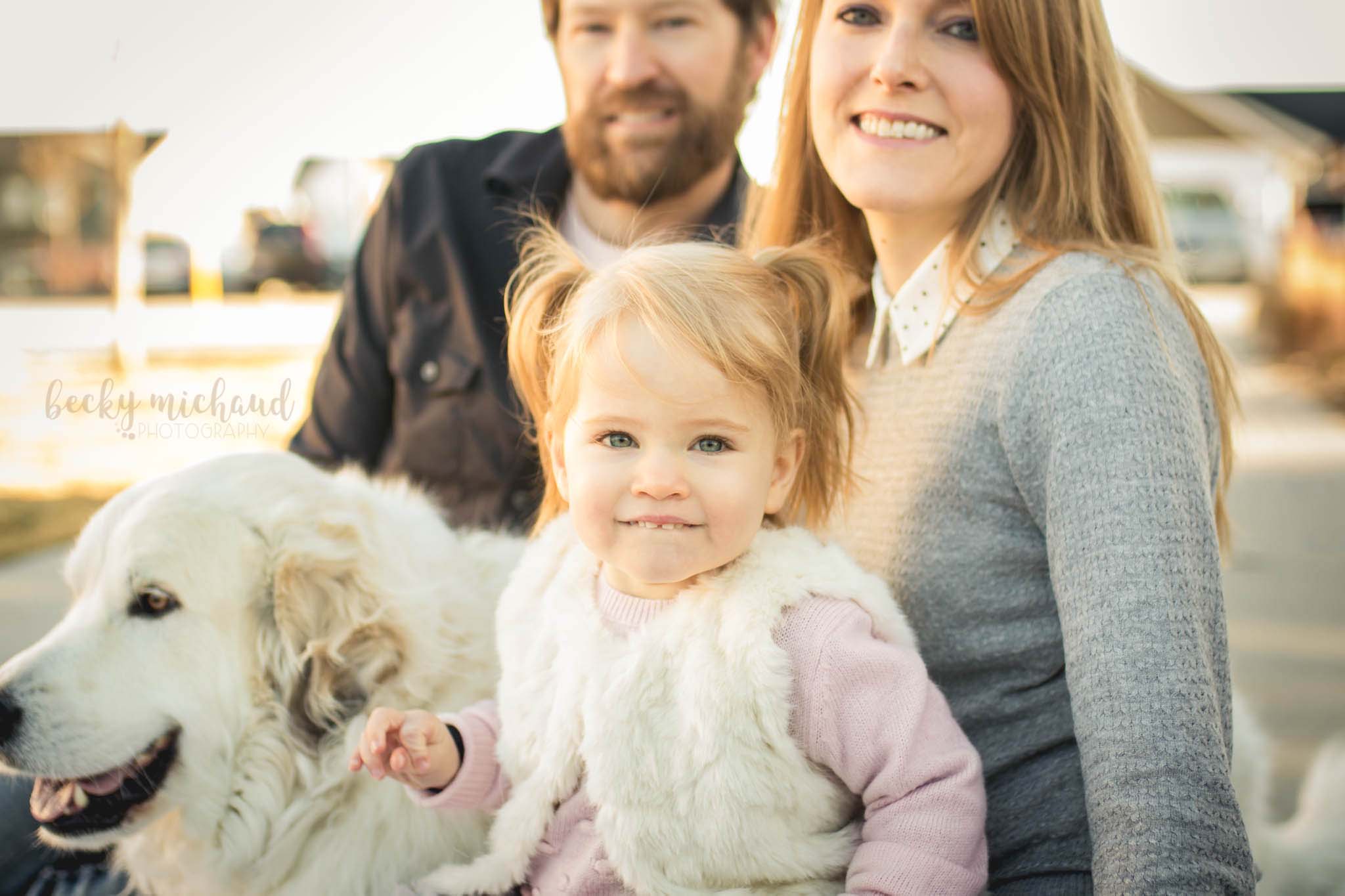 Family of three with their dog