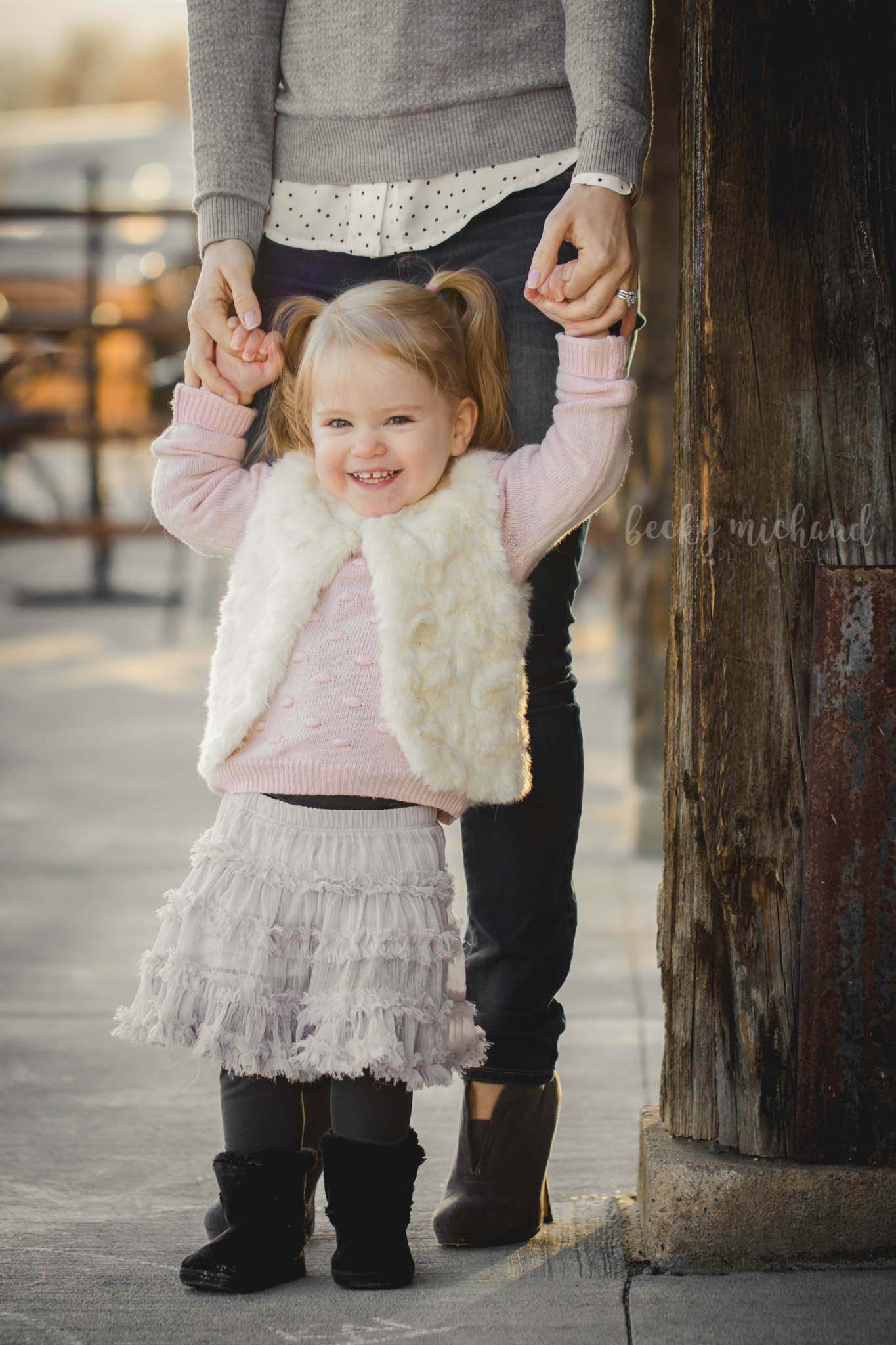 two year old girl wearing a tutu for her milestone photo session