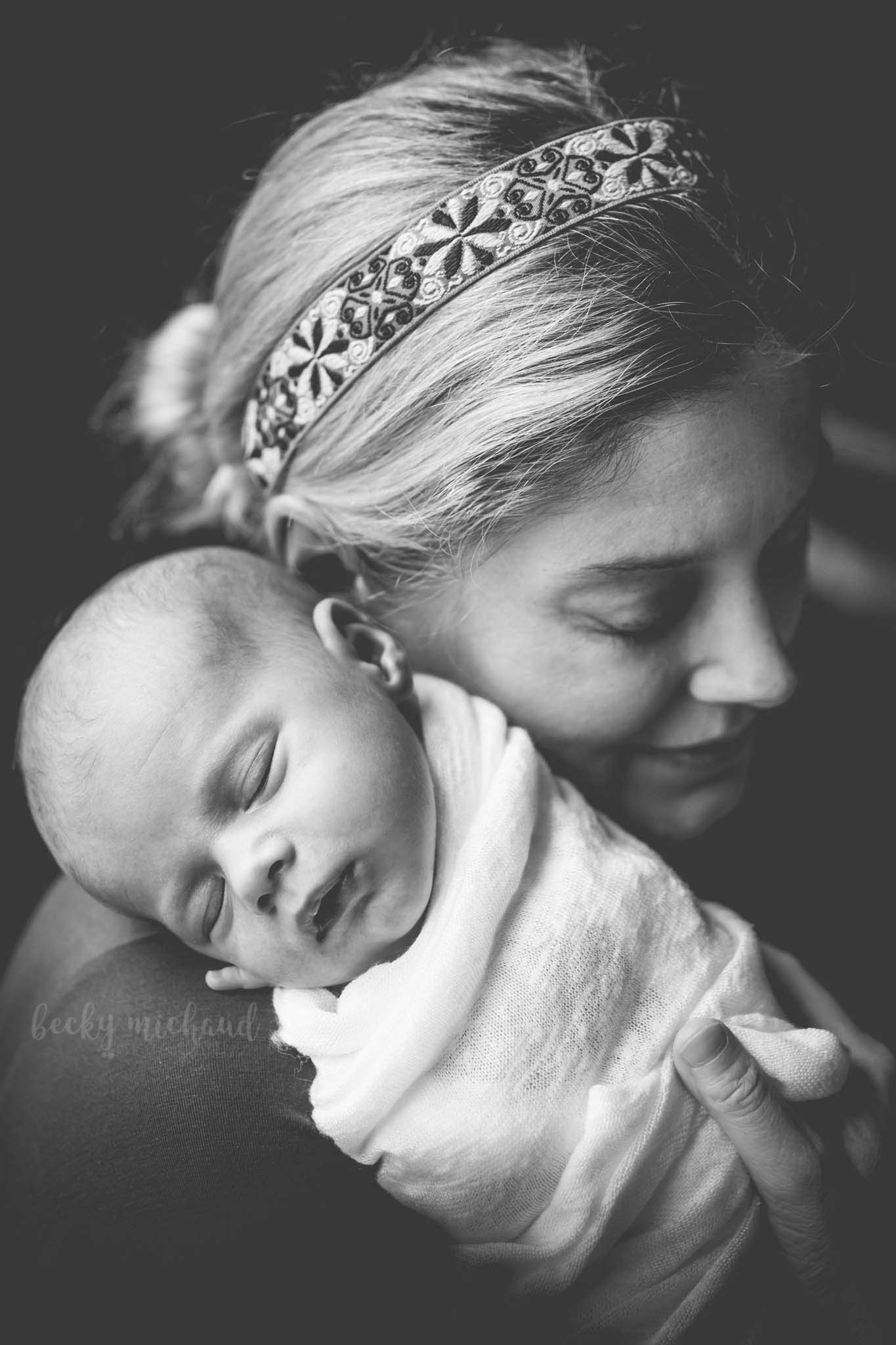black and white portrait of a mother with her newborn baby boy taken by Becky Michaud, Fort Collins newborn photographer