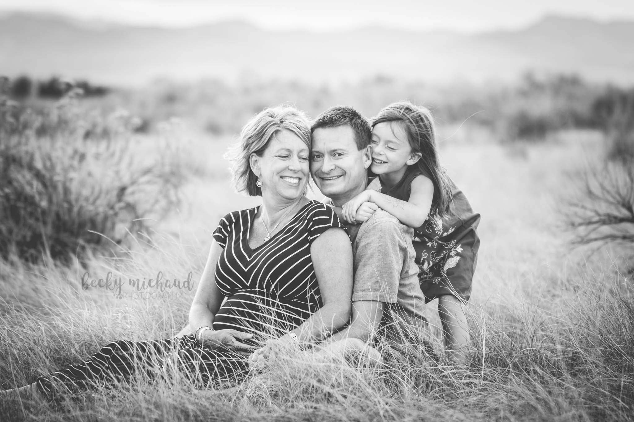 black and white portrait of a family outdoors