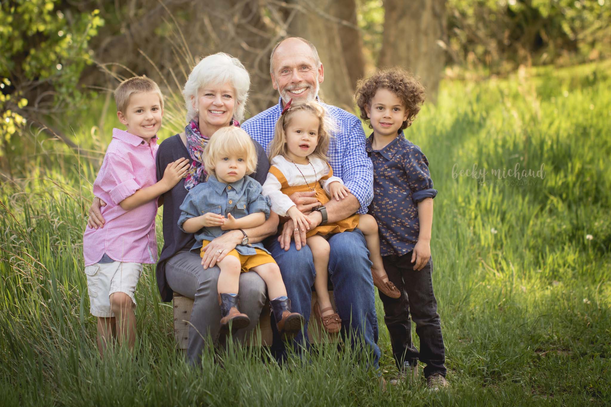 grandparents pose with their grandchildren for their family portrait taken by Becky Michaud, Fort Collins photographer