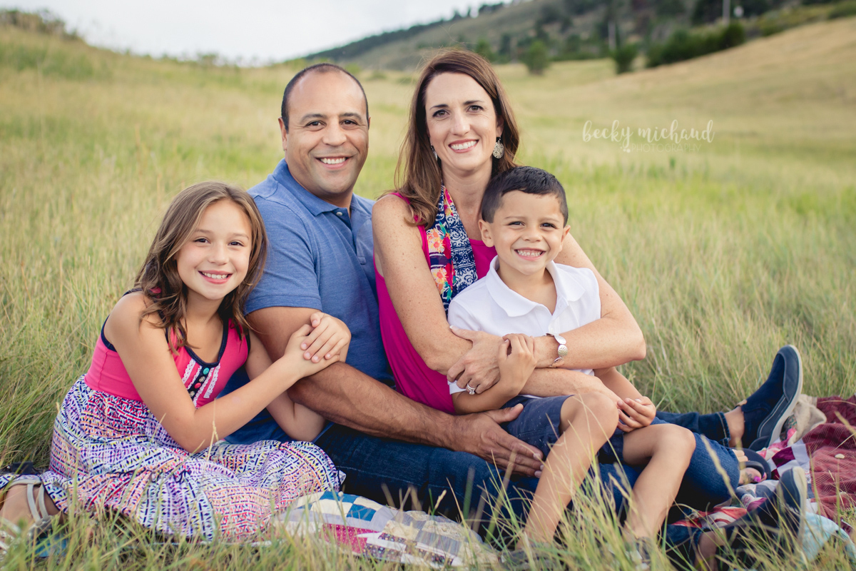 A family poses for a portrait session with Becky Michaud, Fort Collins photographer