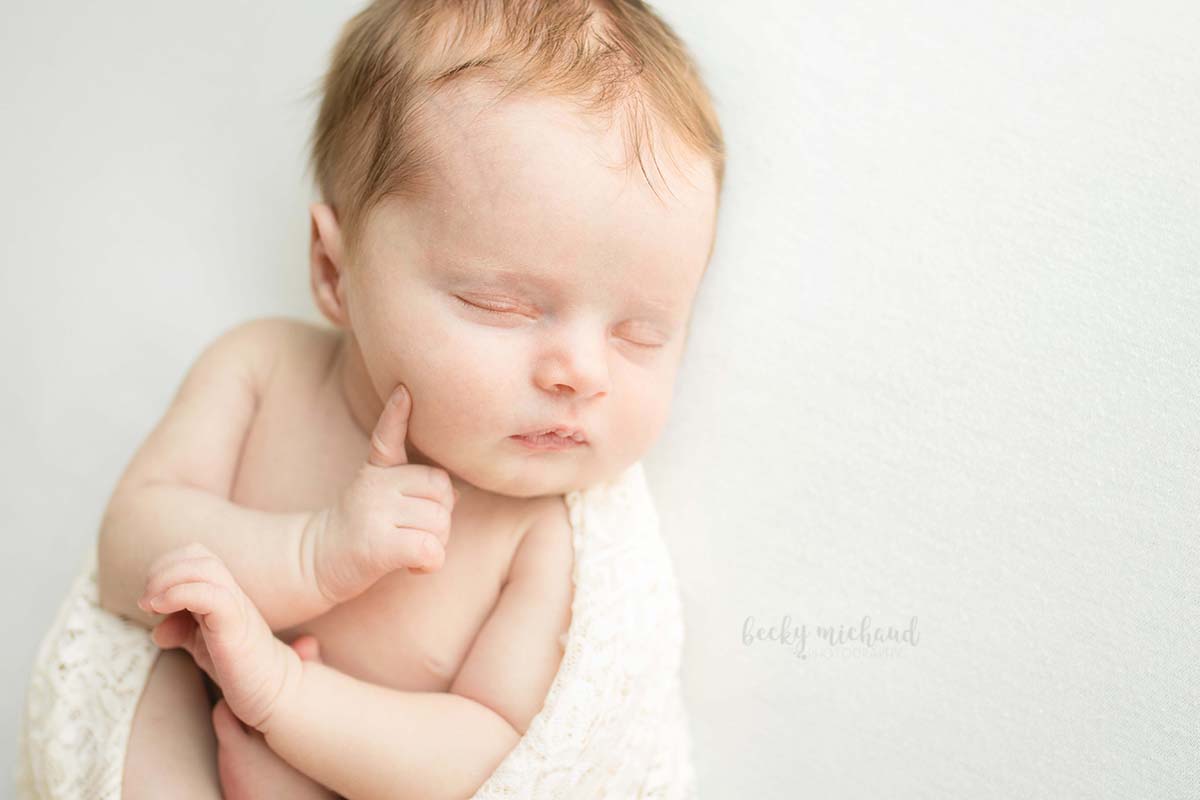 Newborn photo session in Milliken Colorado using natural posing