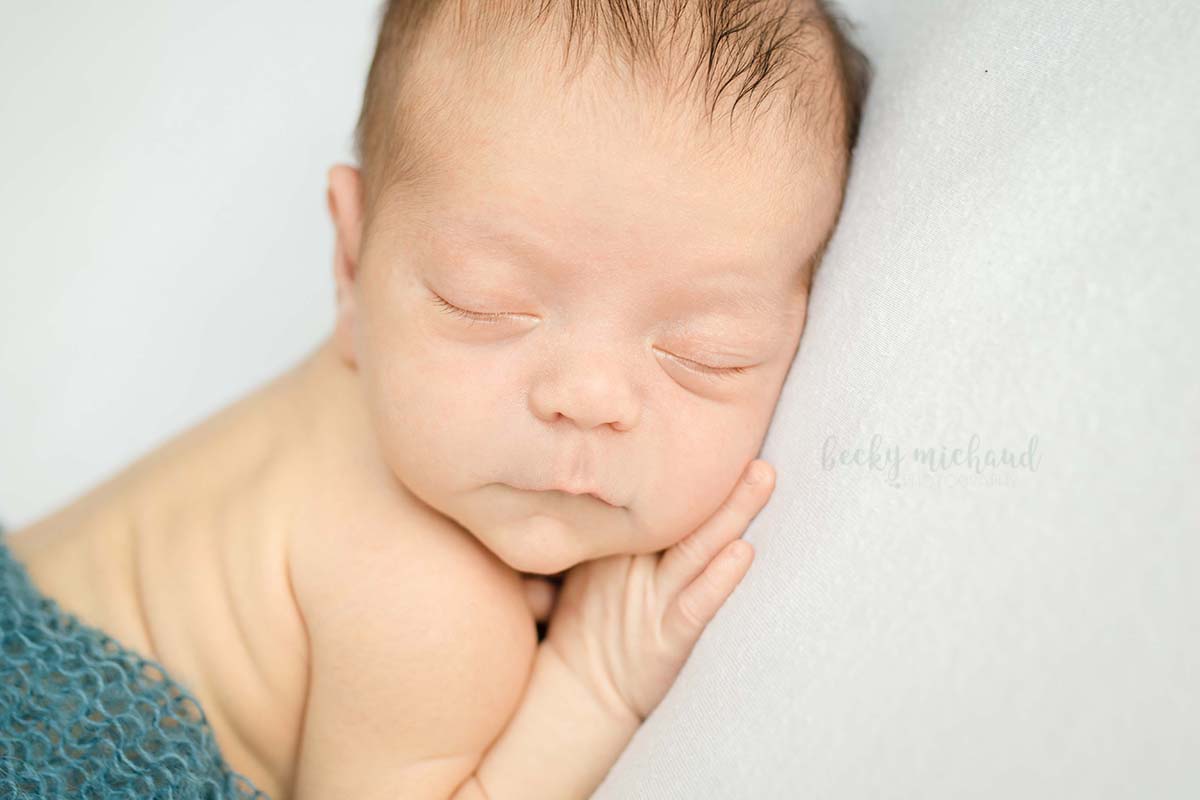 close up of a sleeping newborn