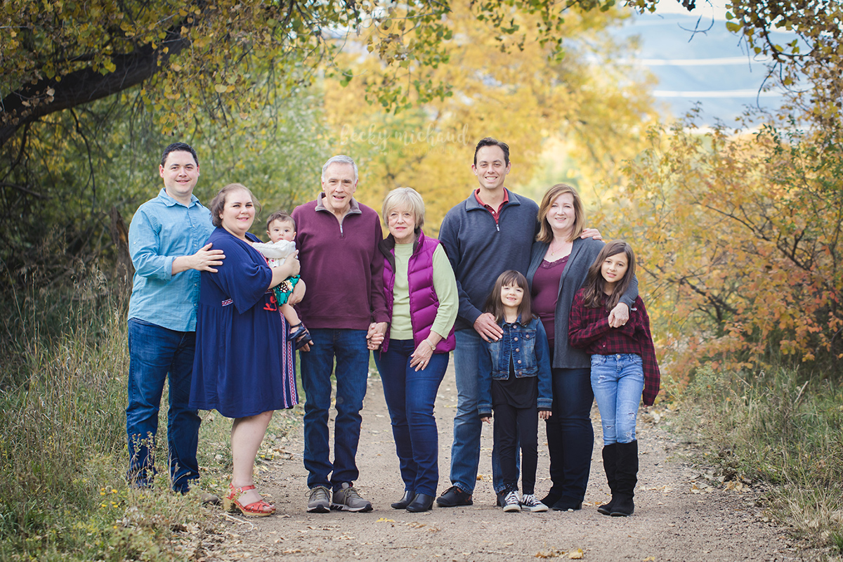 Photo of grandparents with their children and grandchildren in the fall in Northern Colorado