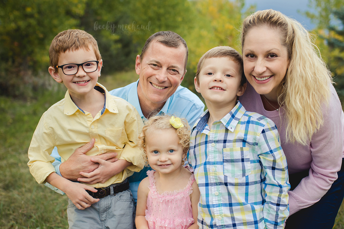 A family of five poses for their northern Colorado family photo session