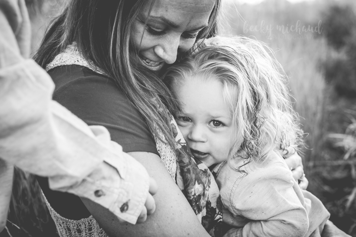 Black and white portrait of a mother holding her young son taken by Becky Michaud, Fort Collins photographer