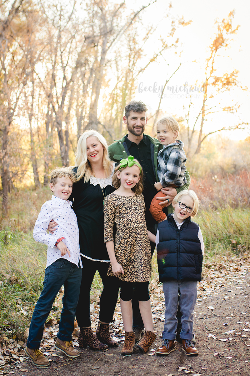 A family poses for their photo session with Becky Michaud, Fort Collins family photographer
