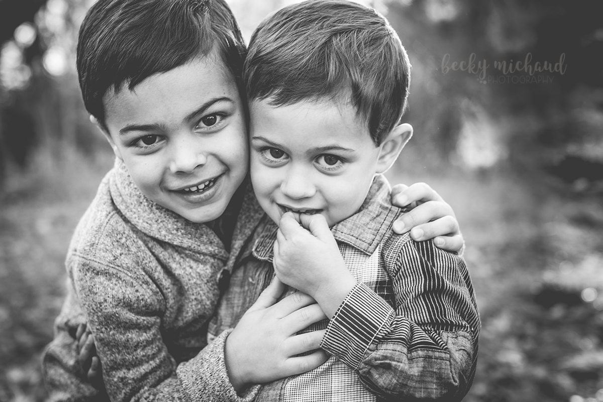 Monochrome photo of two brothers hugging by Becky Michaud, Fort Collins photographer