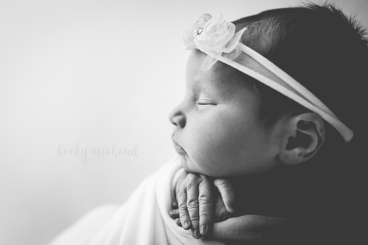 Black and white profile of a baby girl 