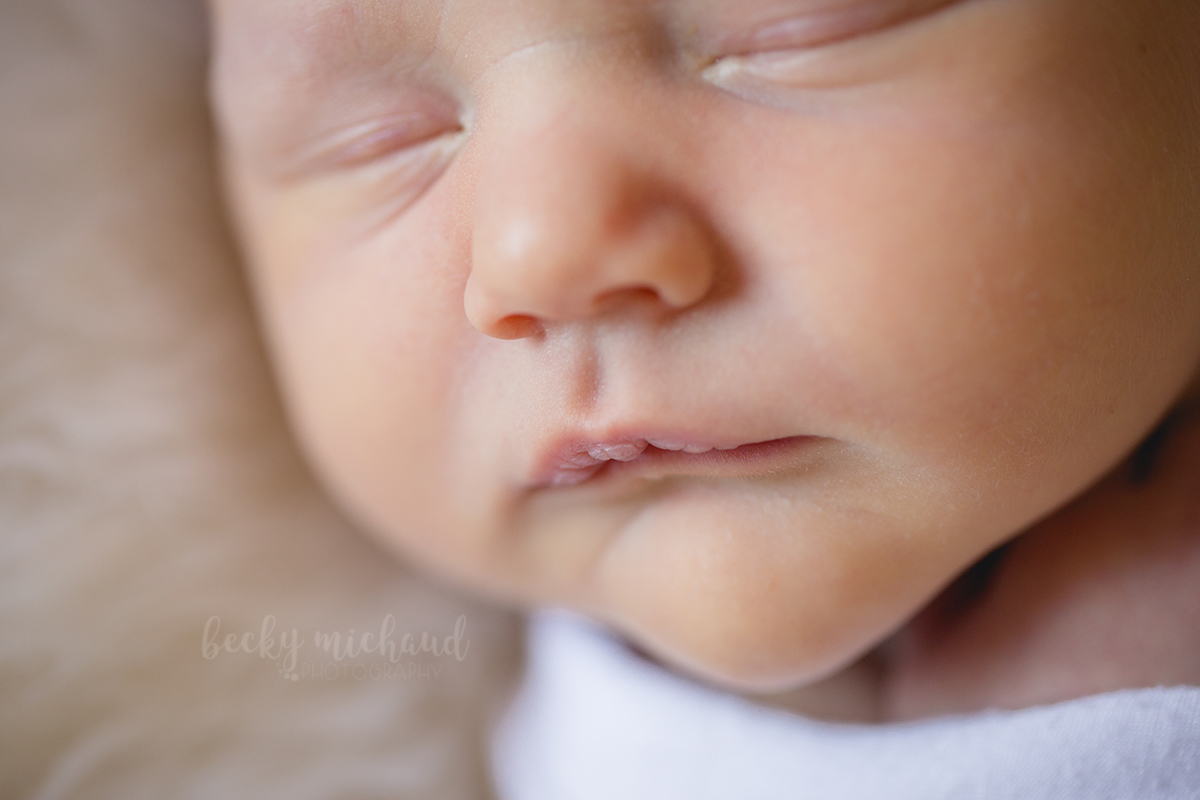 close up of baby face taken by Becky Michaud, Fort Collins newborn photographer