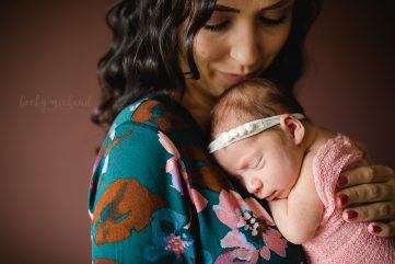 A new mom snuggles with her baby girl in Johnstown, Colorado