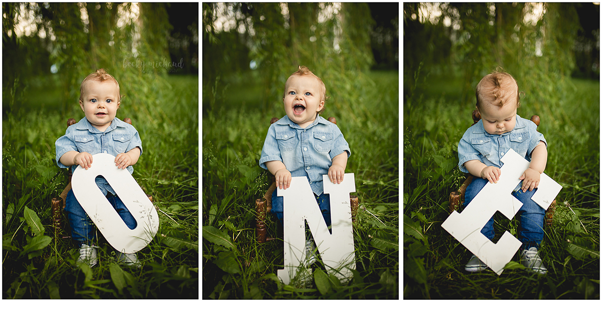 One year photos of a baby boy holding big white letters 