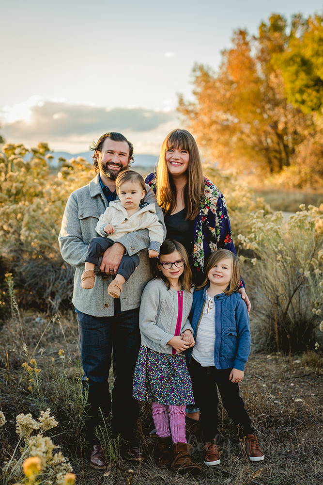 Fall leaves in Fort Collins provide a beautiful backdrop for a family photo for this family of five