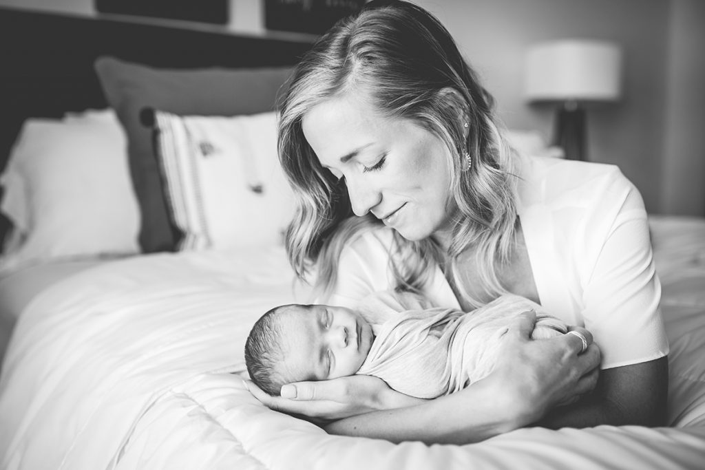 black and white photo of a mom with her newborn baby taken by Becky Michaud, Fort Collins newborn photographer
