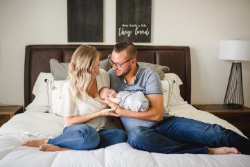Lifestyle Newborn Photo of a family of three in their Fort Collins, Colorado home