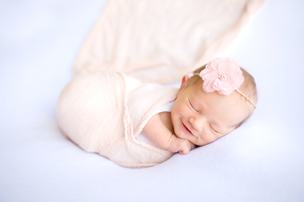 smiling newborn photo taken by Becky Michaud, Fort Collins Baby Photographer