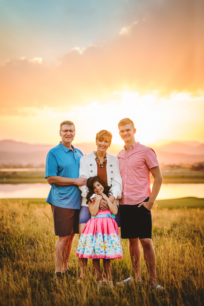 Family of four photography session at TPC Colorado Course