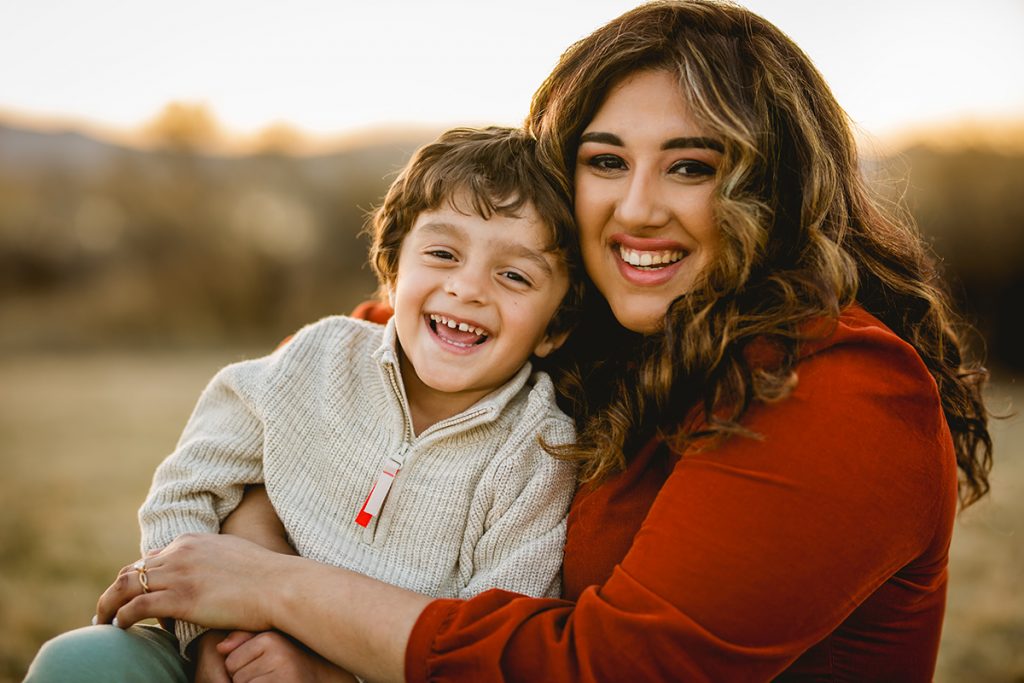 Mom and son smile and laugh together in a photo taken by Becky Michaud, Fort Collins photographer