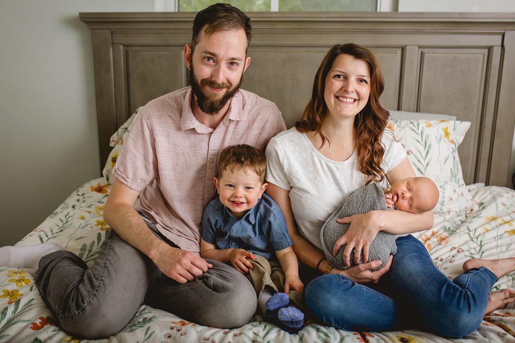 Family photo during a newborn session in baby's home in Greeley, Colorado