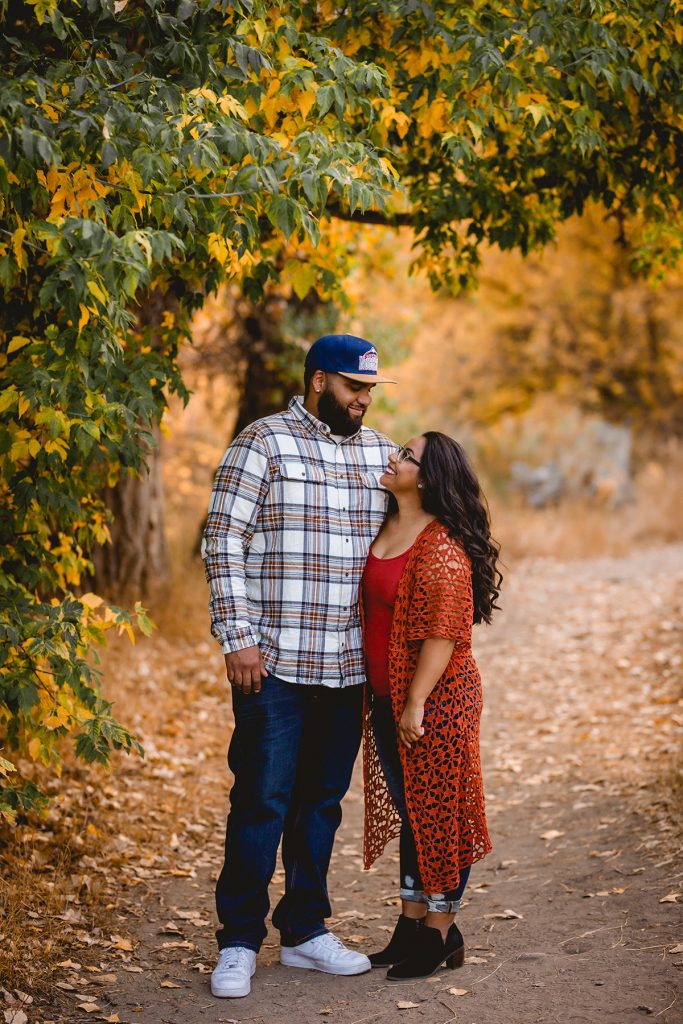 Portrait of a couple in the fall leaves in Colorado